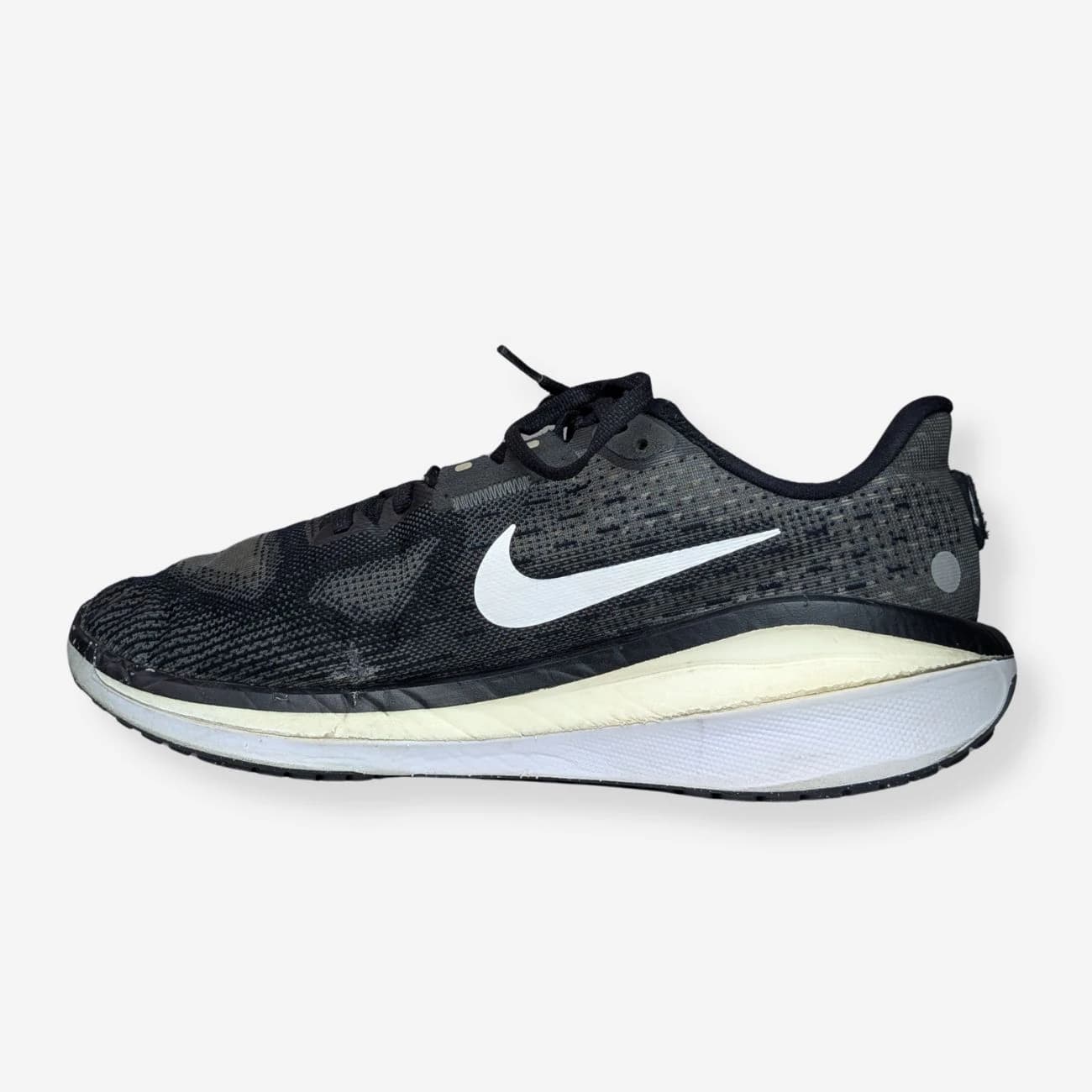 Nike Men's Vomero 17 running shoes in black and white, featuring a breathable mesh upper, cushioned midsole, and durable rubber outsole. Designed for comfort and performance, perfect for runners.